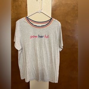 Crew neck grey t-shirt with colorful neck band.